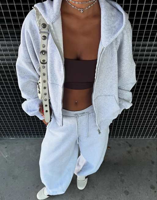 Veste à capuche zippée en tissu duveteux