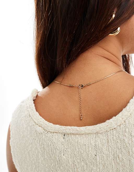 Collier chaîne lasso en maille serpent fine à détails nœud