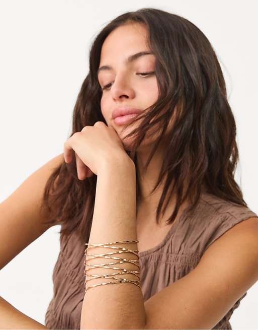 Crossed bangle bracelet
