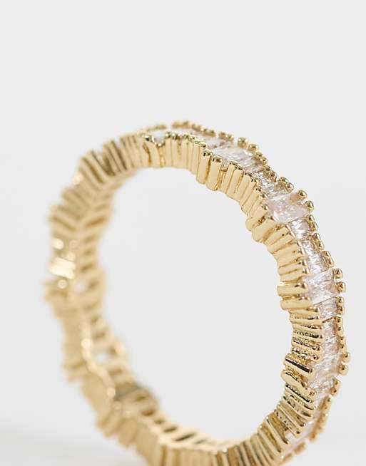 Fine ring with cubic zirconia stones in gold finish
