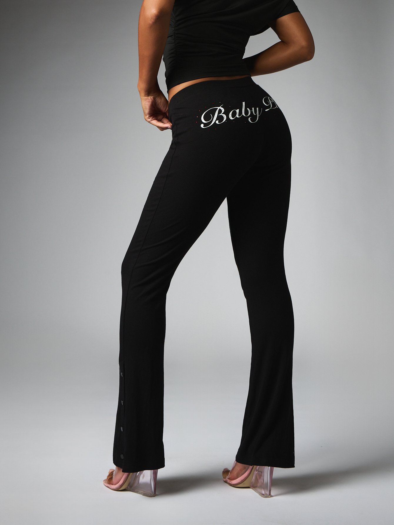 Pantalon évasé taille haute côtelé avec logo script