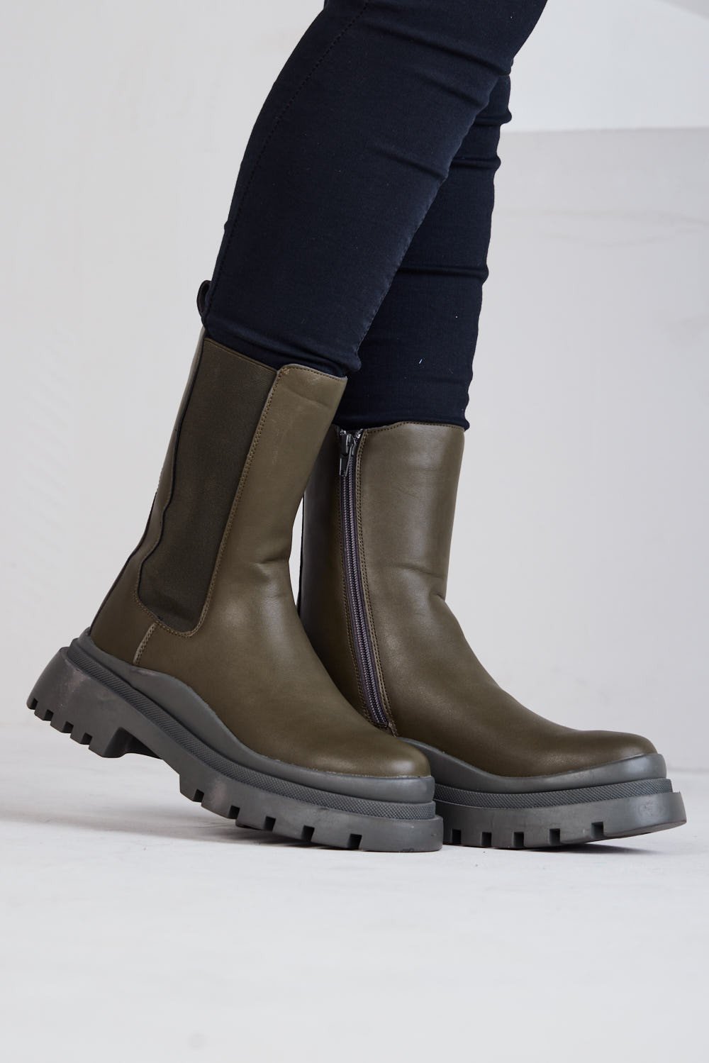 Dark green faux leather ankle boots