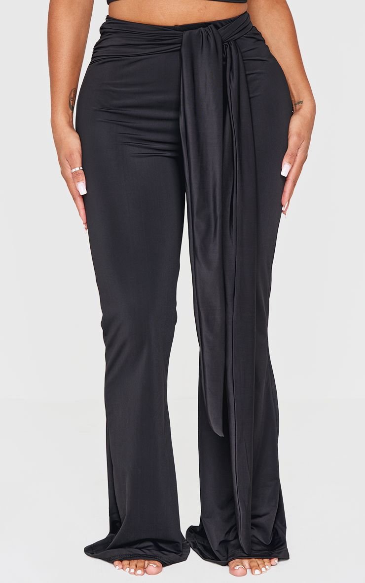 Sculpt wrap waist flared trousers