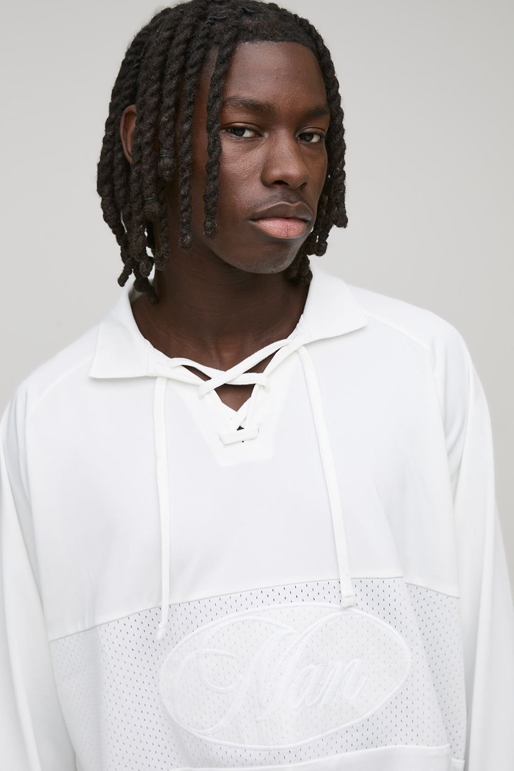 Haut sport oversize en maille b col lacets