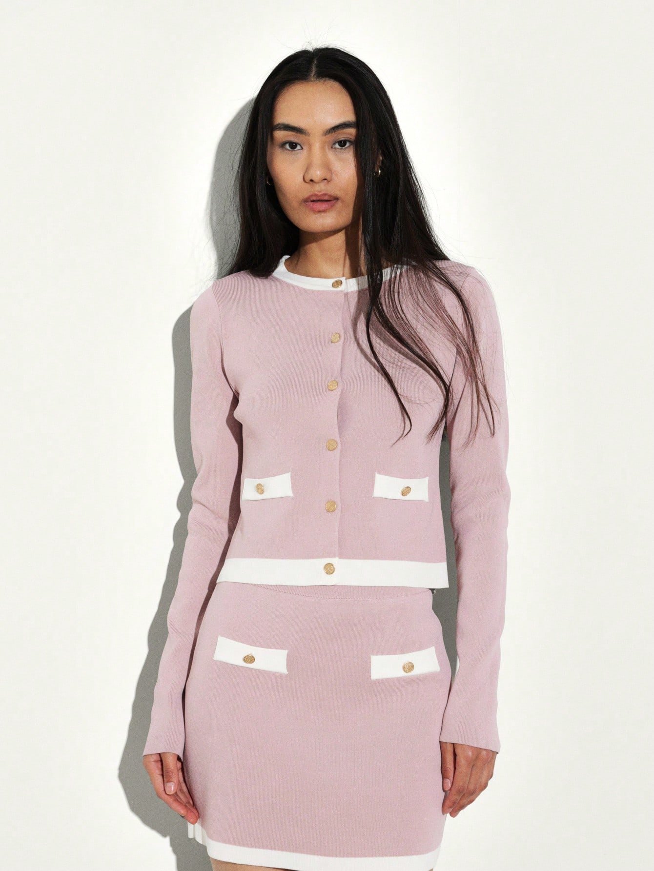 Knitted set with round-neck cardigan and mini skirt