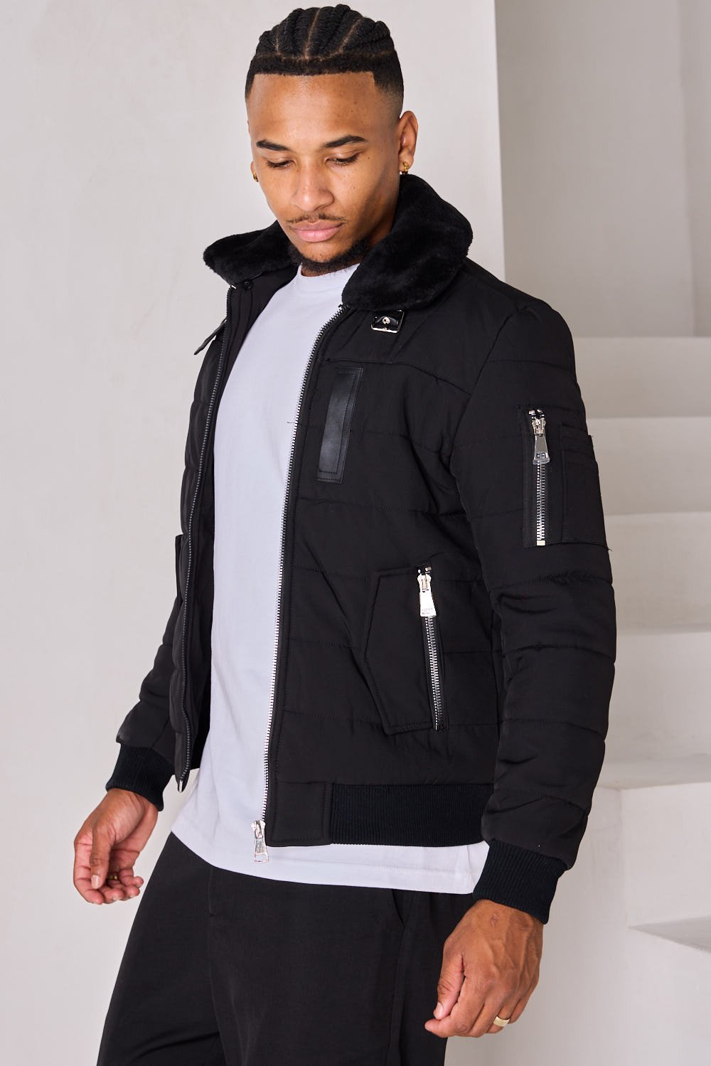 Black quilted jacket with fur collar