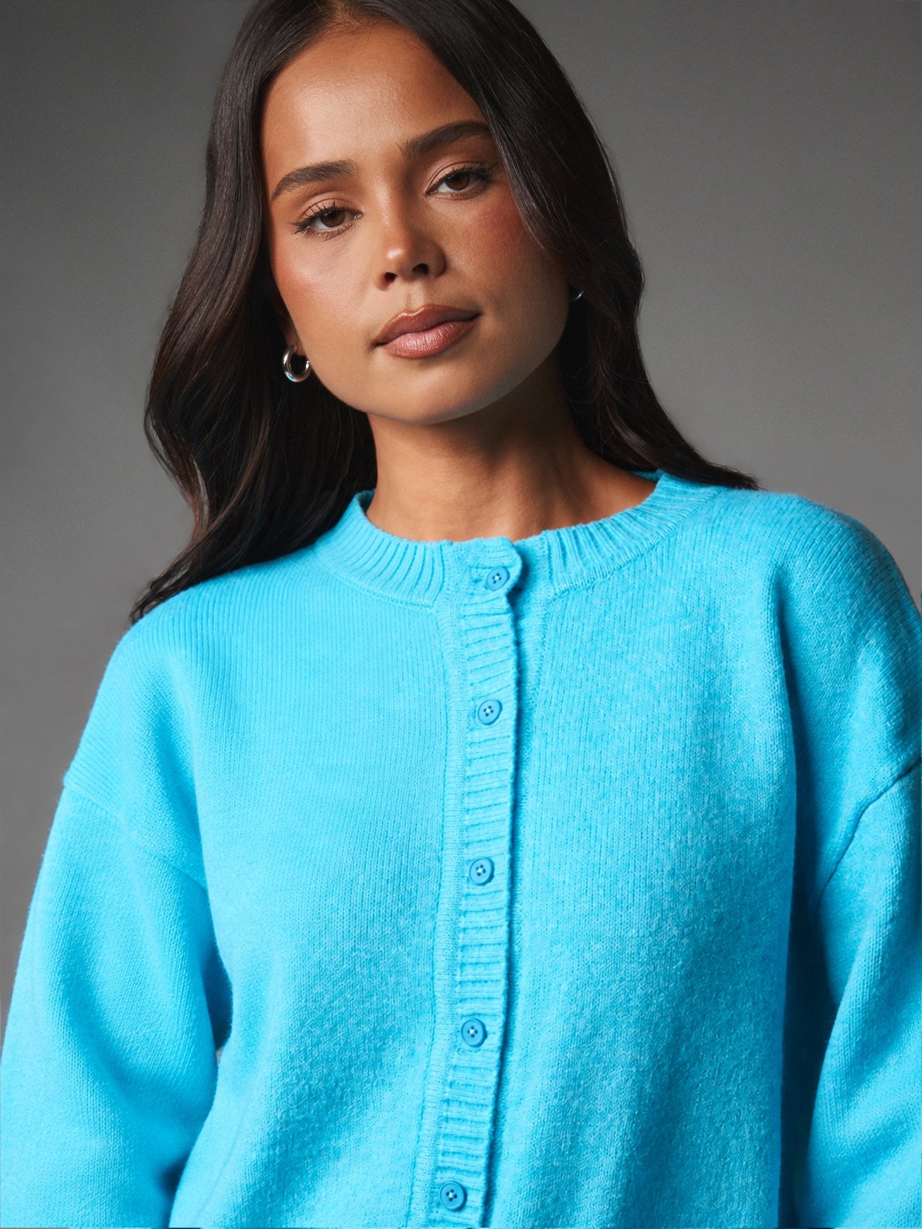 Cardigan court en maille à boutonnage devant