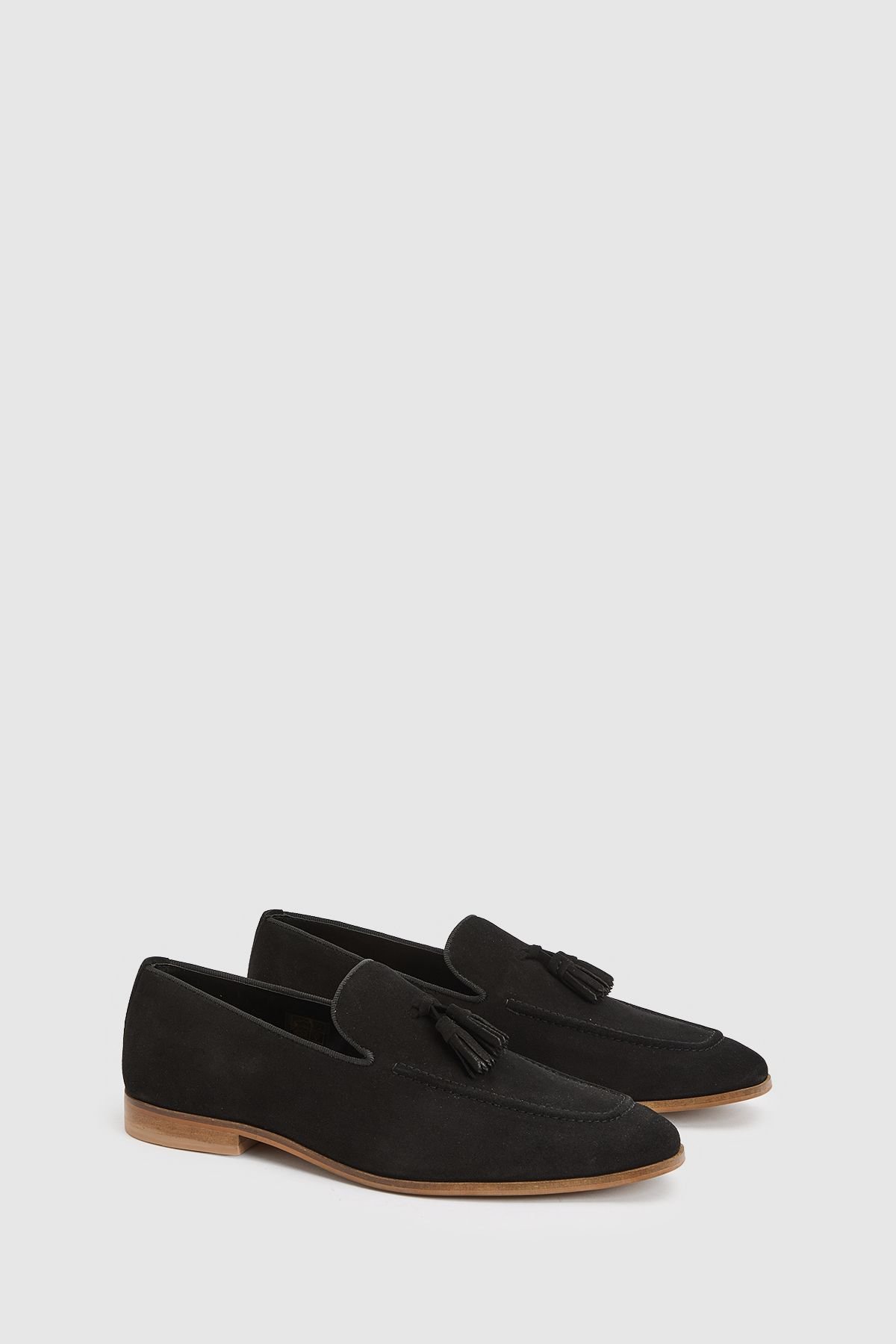 Mocassin à pompons en daim noir