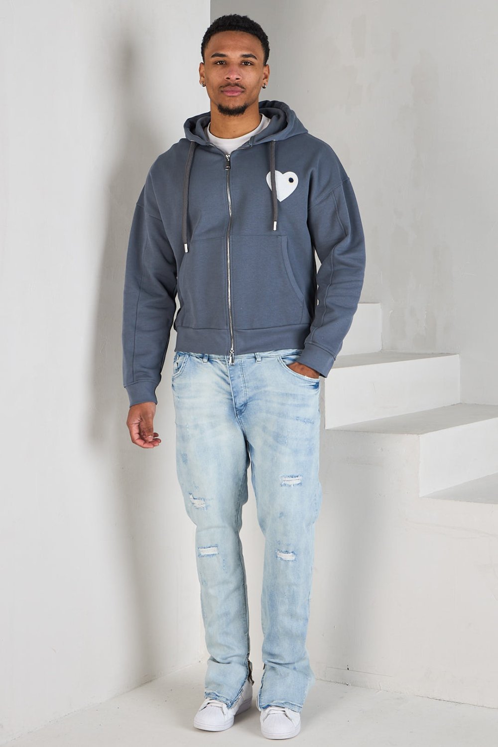 Grey zip-up hoodie with embroidered heart