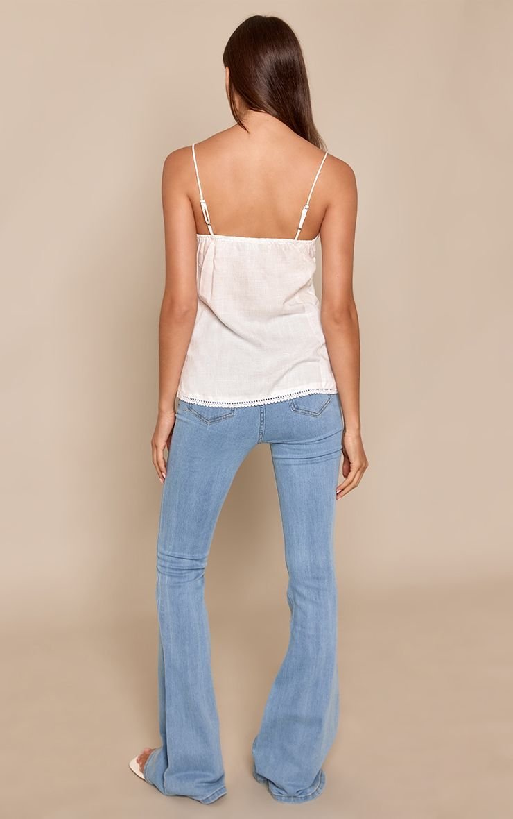 Blue five-pocket flared jeans