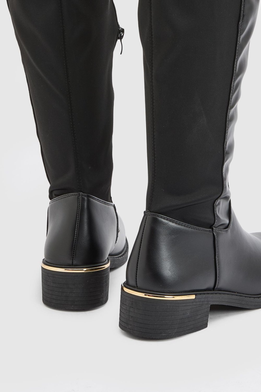 Black chunky knee-high boots