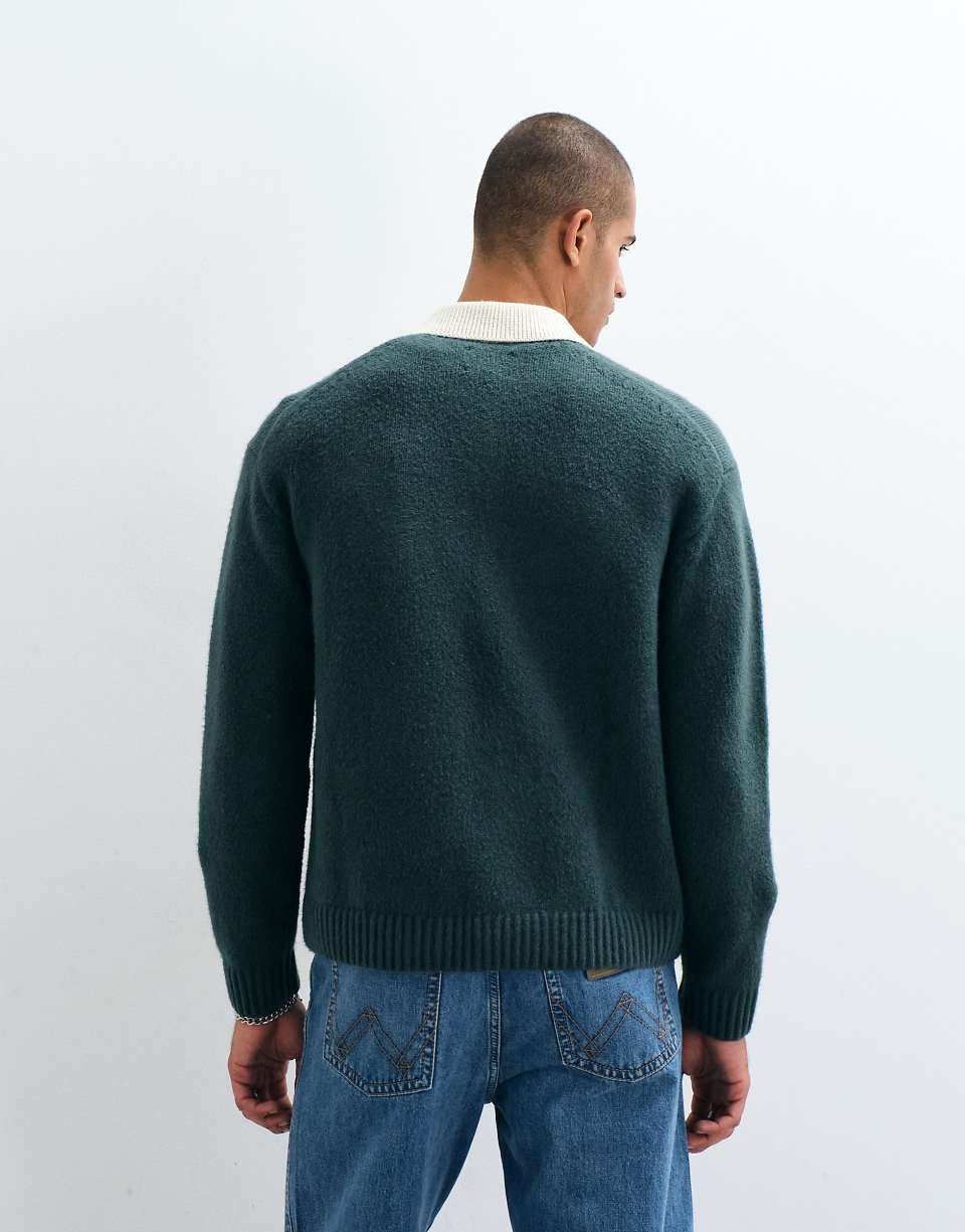 Pull polo tricot b kmam twal w boutonat b col mkhalf khder ghamq
