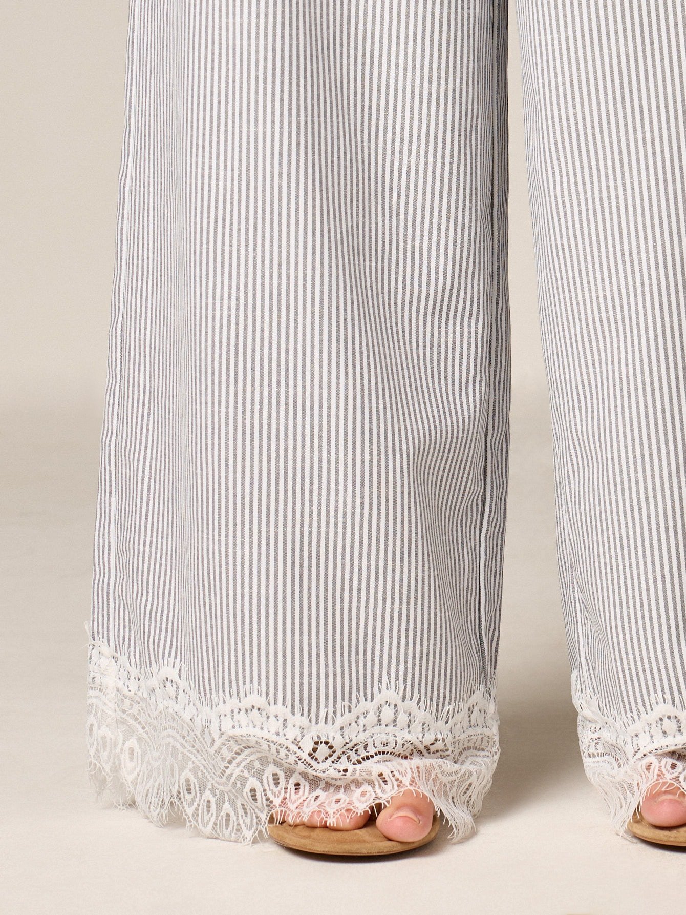 Pantalon palazzo à jambes larges avec ourlet