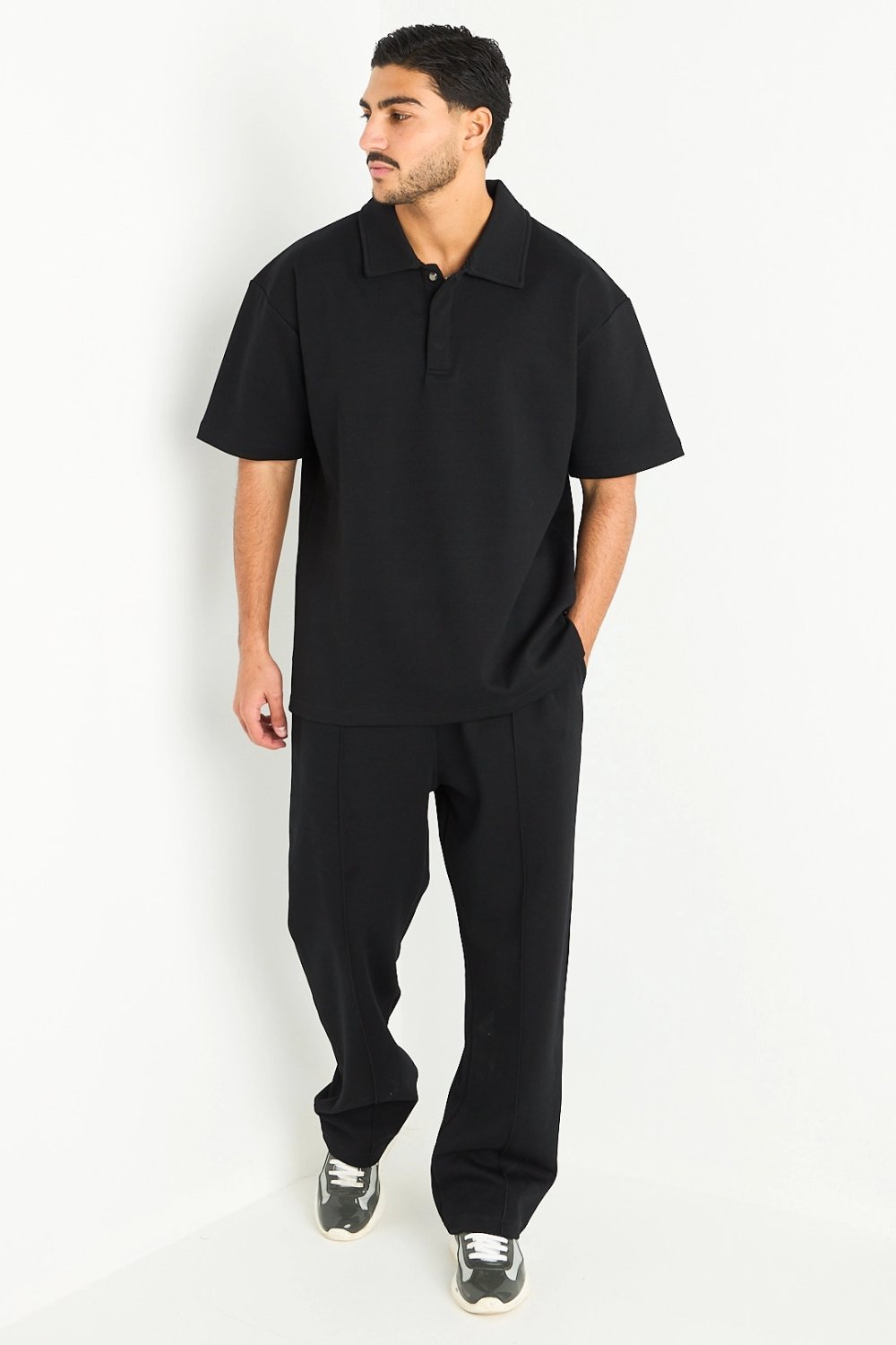 Black polo shirt and straight trousers set