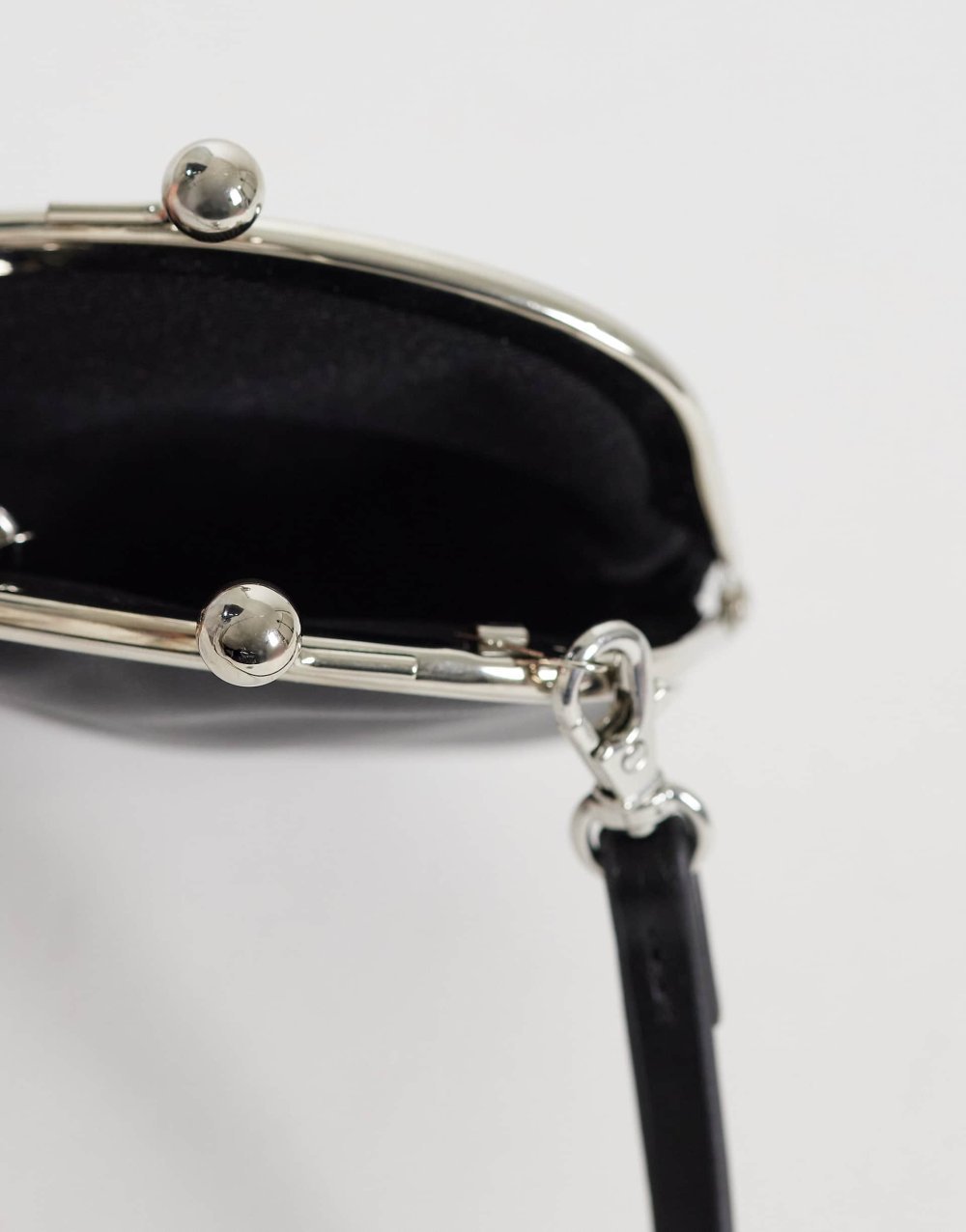 Black mini clutch bag with charms