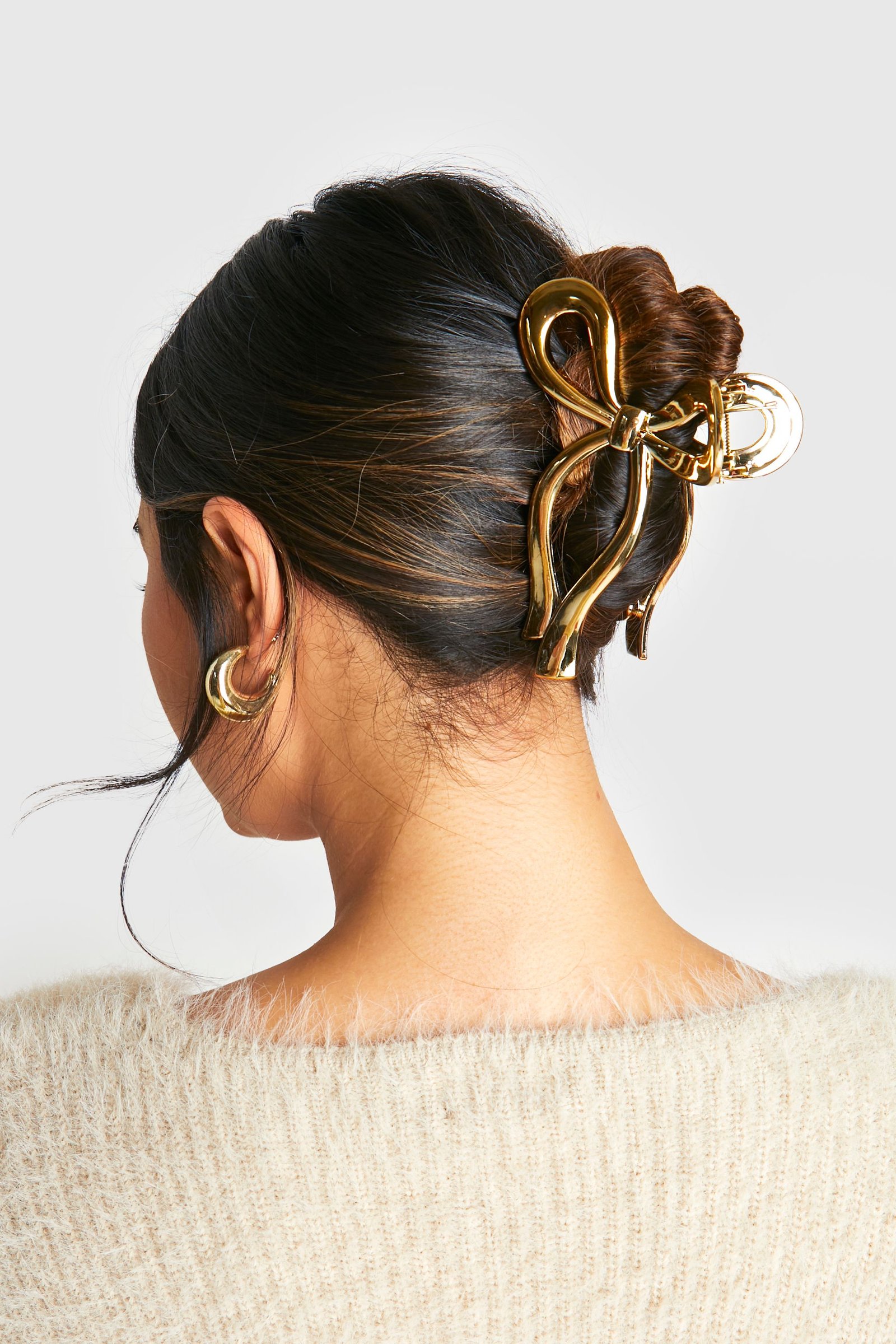 Pince à cheveux à nœud doré