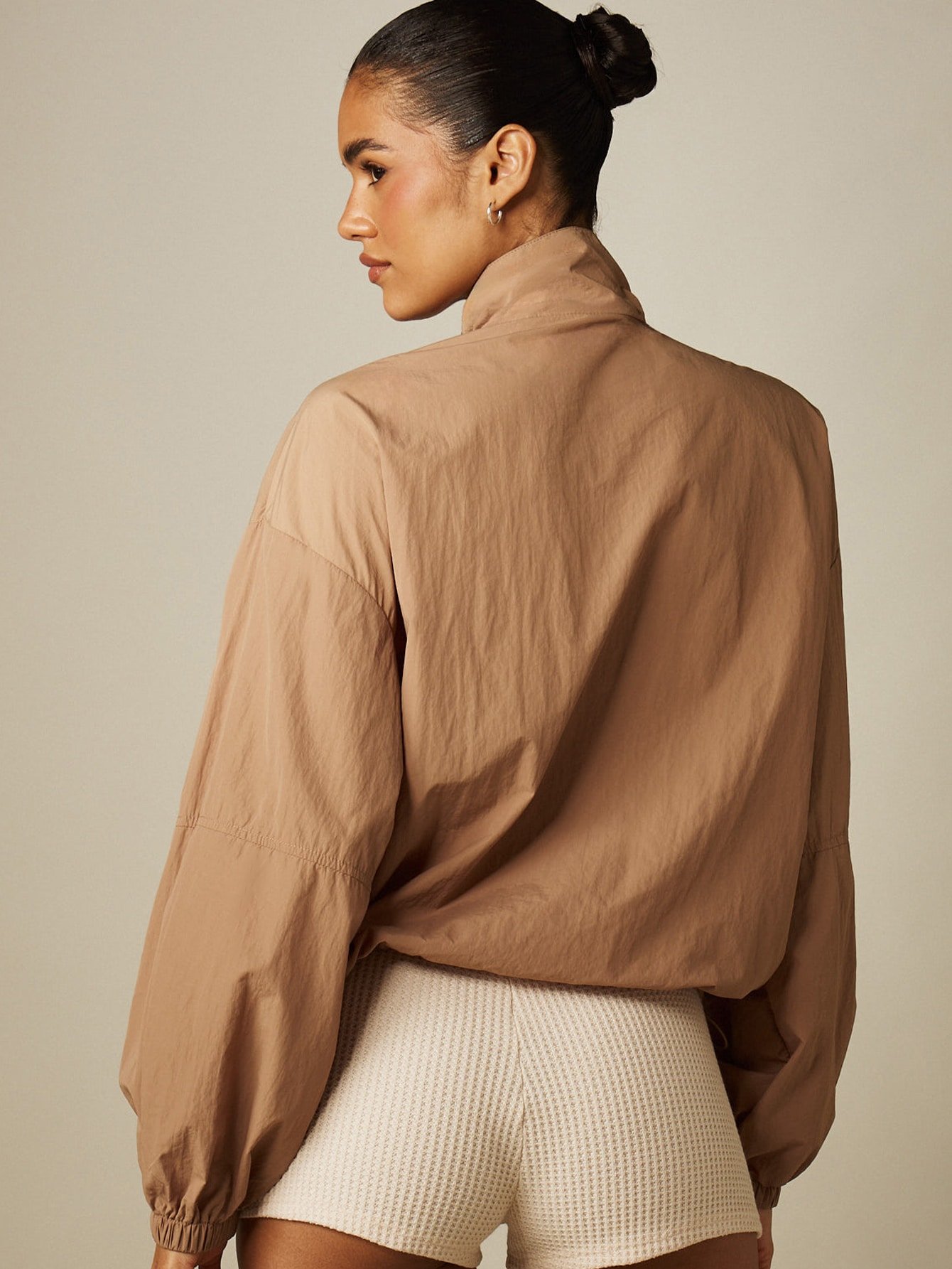 Utility windbreaker jacket with cargo pockets