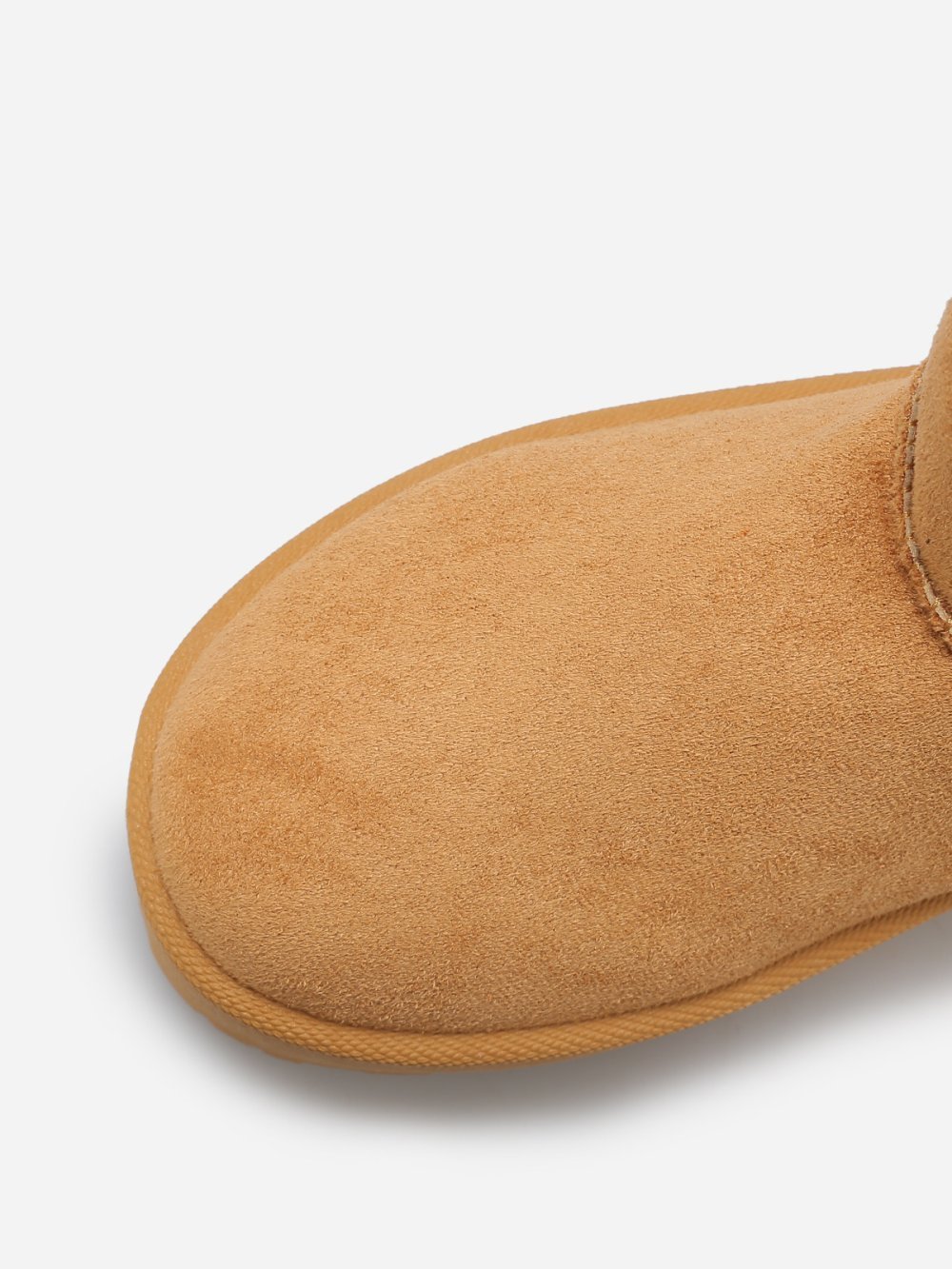 Boots basses fourrées à surpiqûres camel