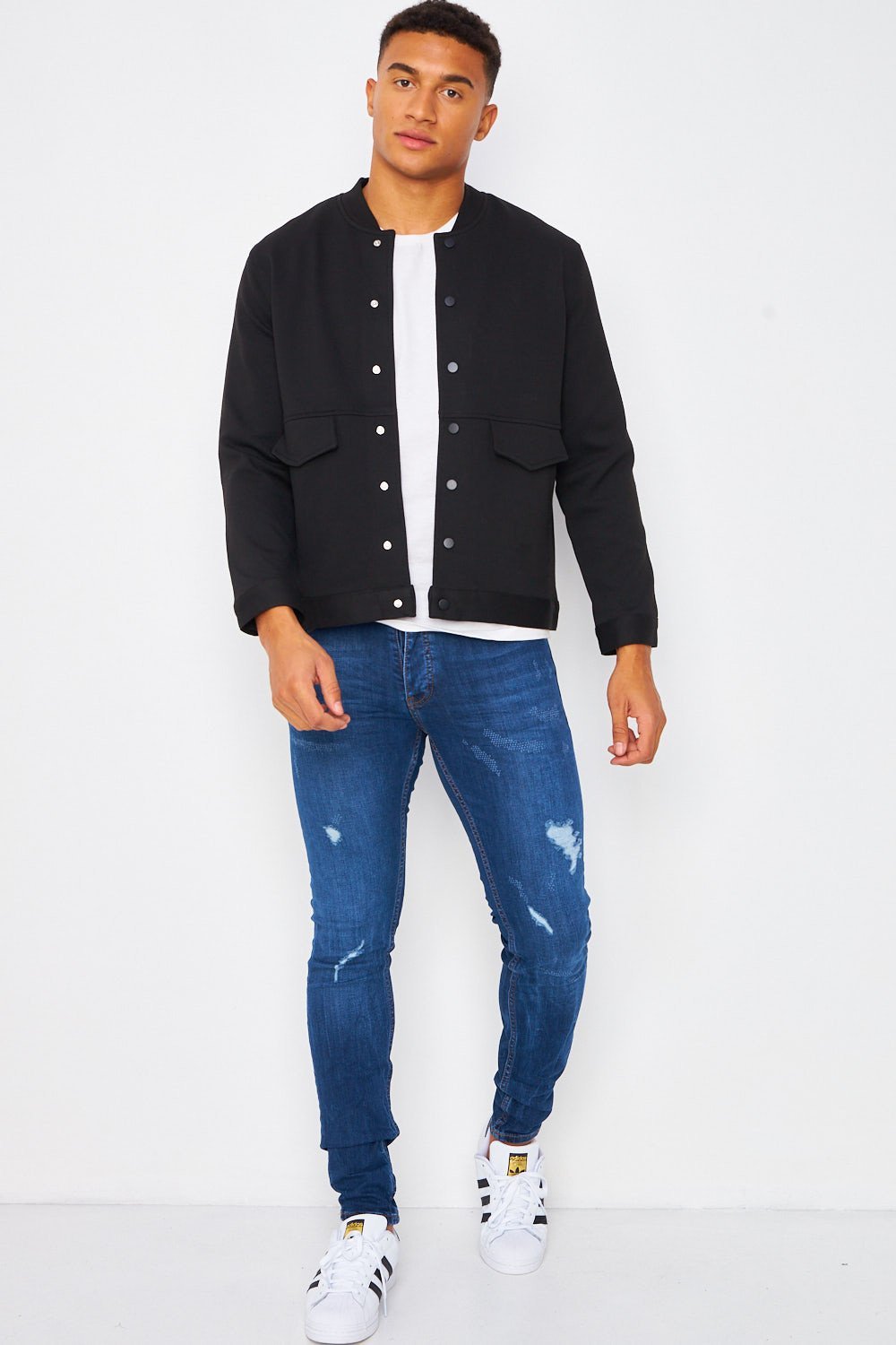 Plain black bomber with concealed buttons