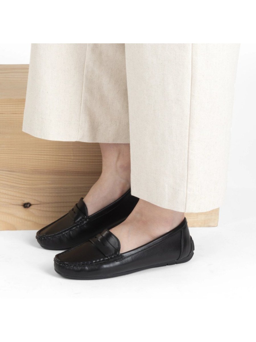 Black faux leather penny loafers