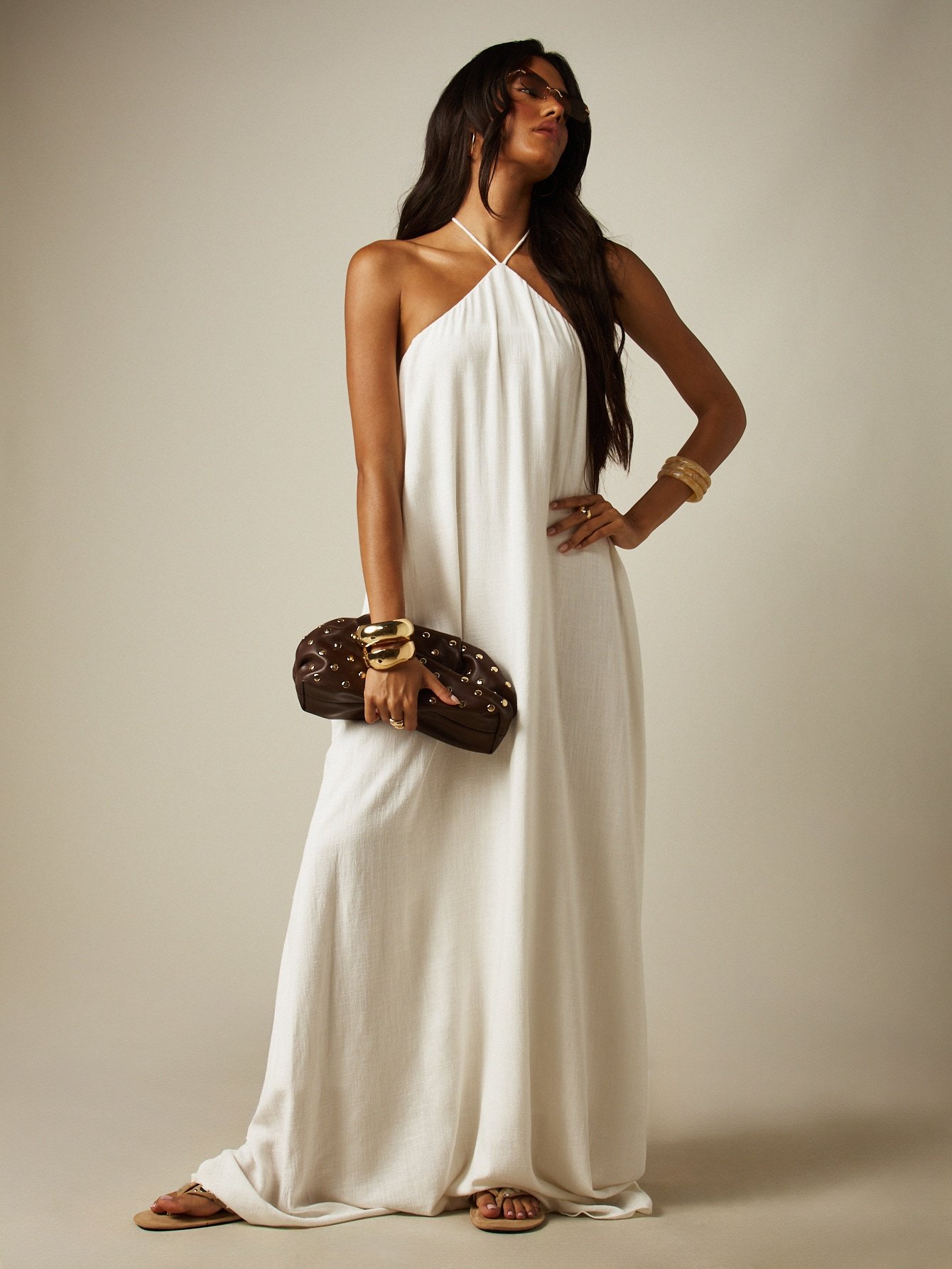 Flowing backless halter neck maxi dress
