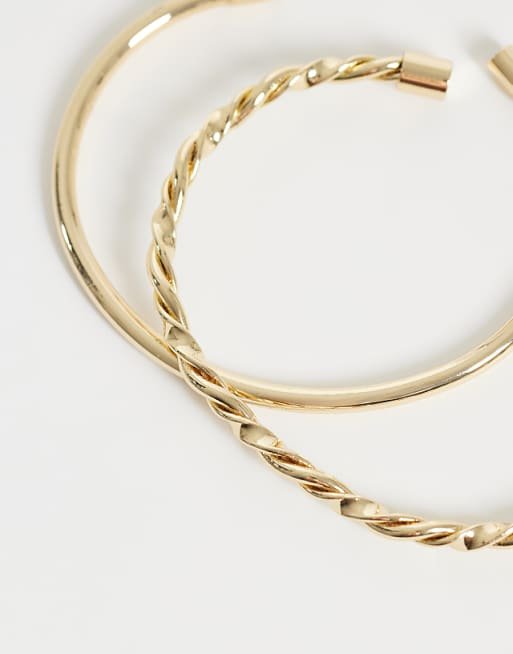 Lot de 2 bracelets manchette avec détail uni et torsadé ton doré