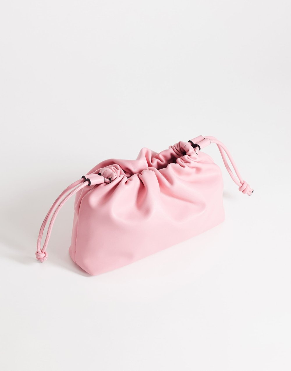 Pink ruched faux leather clutch bag