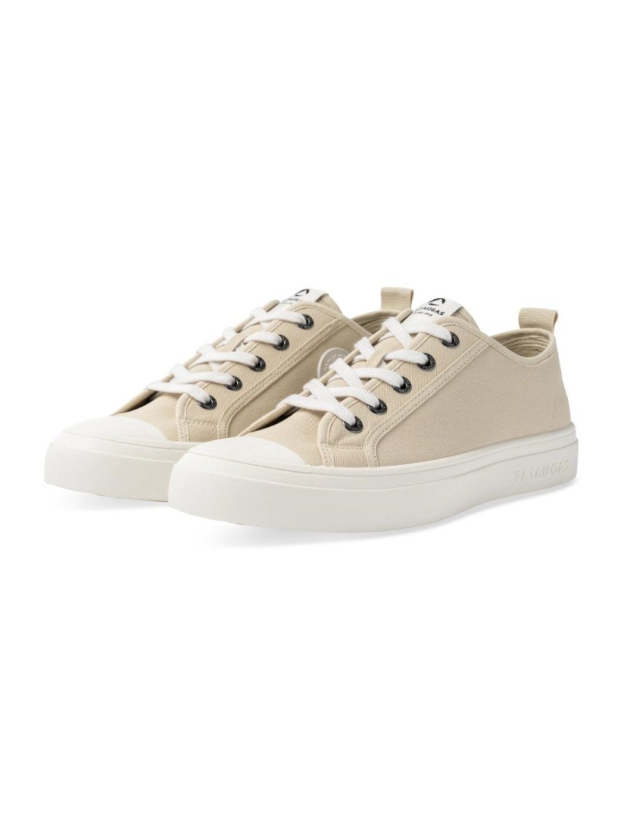 Beige canvas sneakers with rubber toe