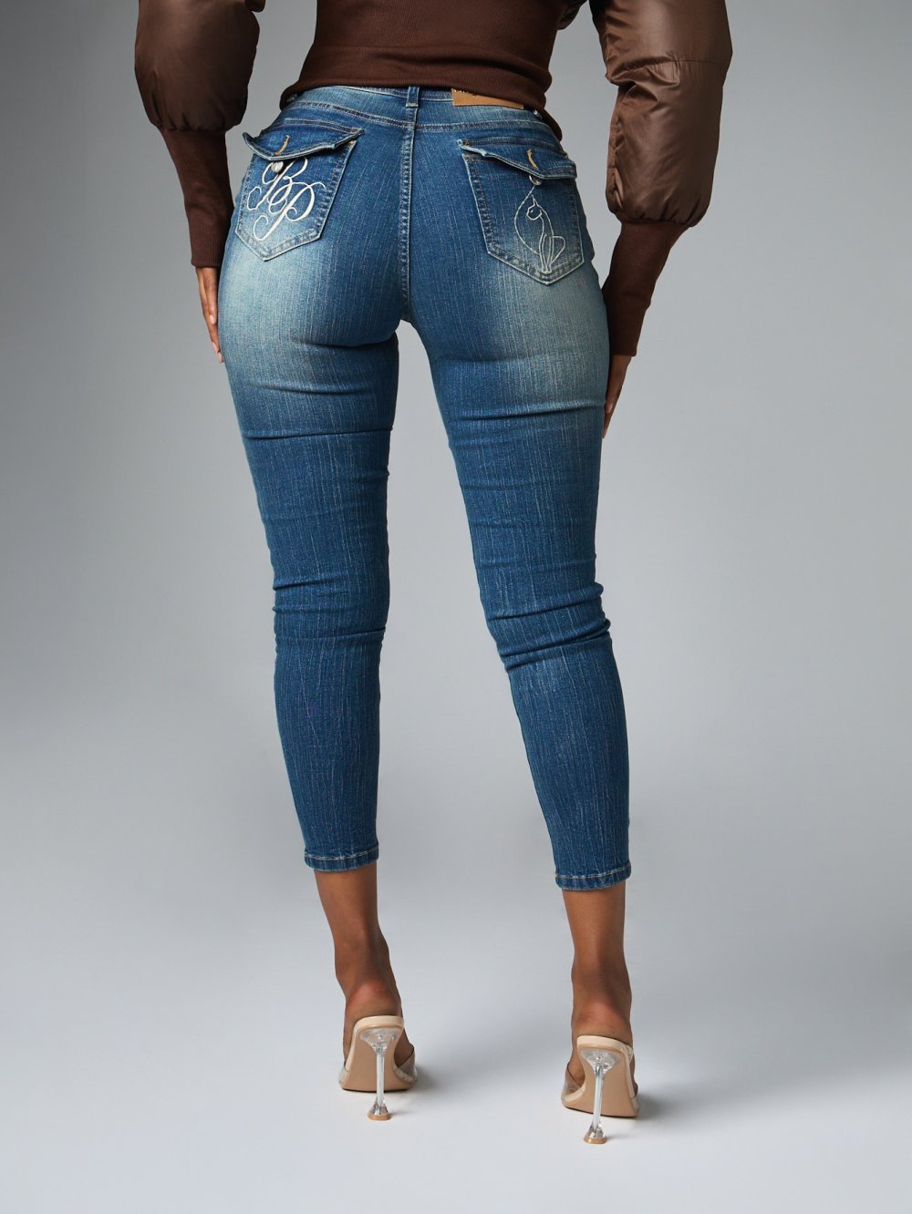 Mid blue high-waisted skinny jeans with pocket details