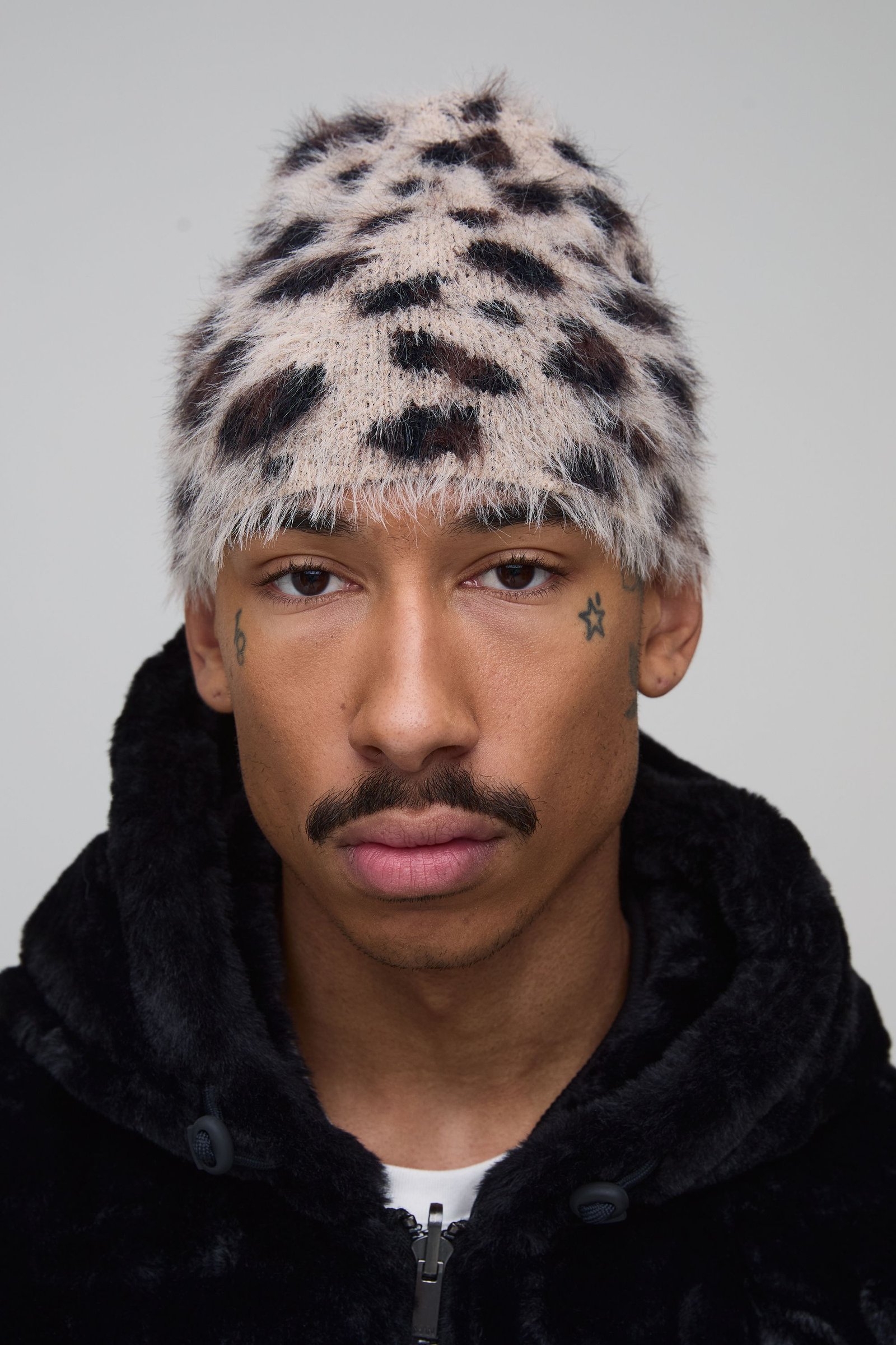 Bonnet léopard moelleux