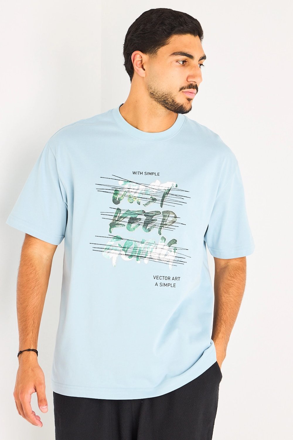 Tee-shirt à inscription sur le torse bleu clair