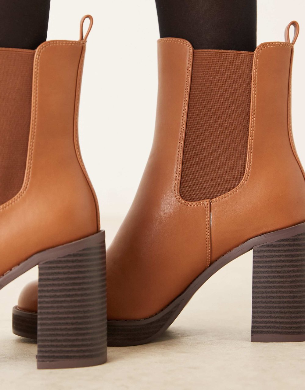 Platform heeled ankle boots in tan