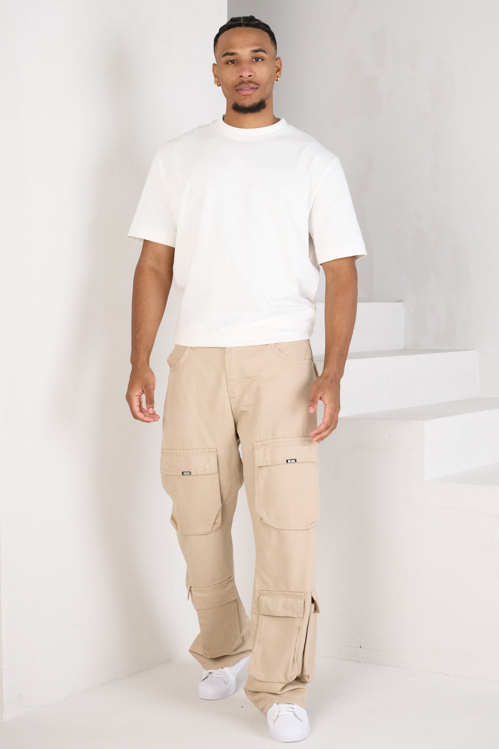 Beige loose-fit jeans with pockets