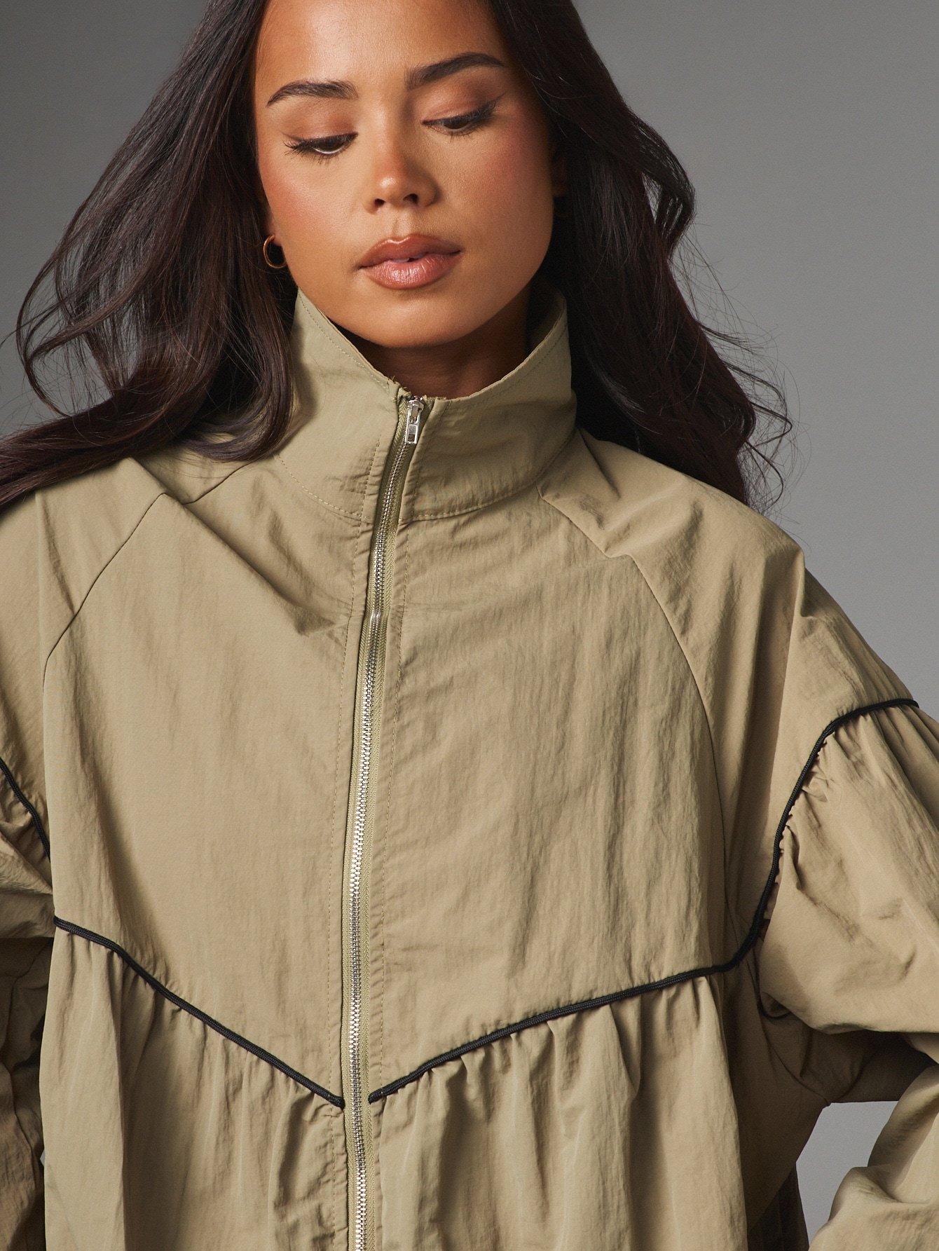 Oversized windbreaker with ruffle hem