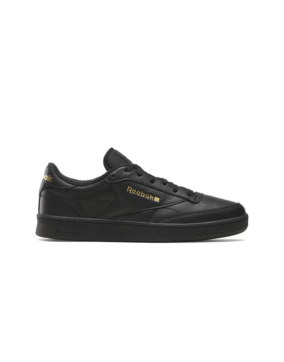 Club C 85 trainers in black and gold