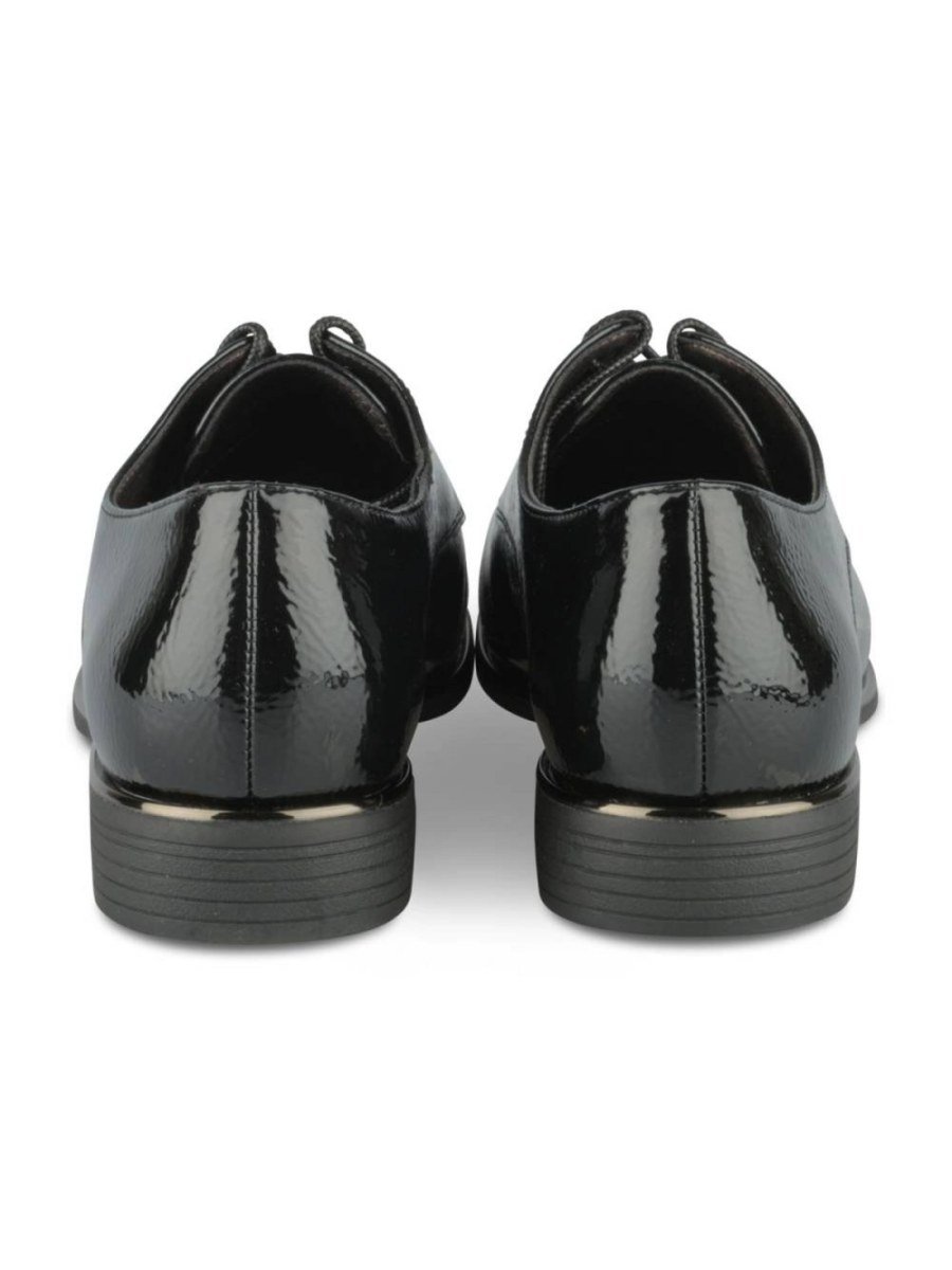 Black patent derbies with metallic trim