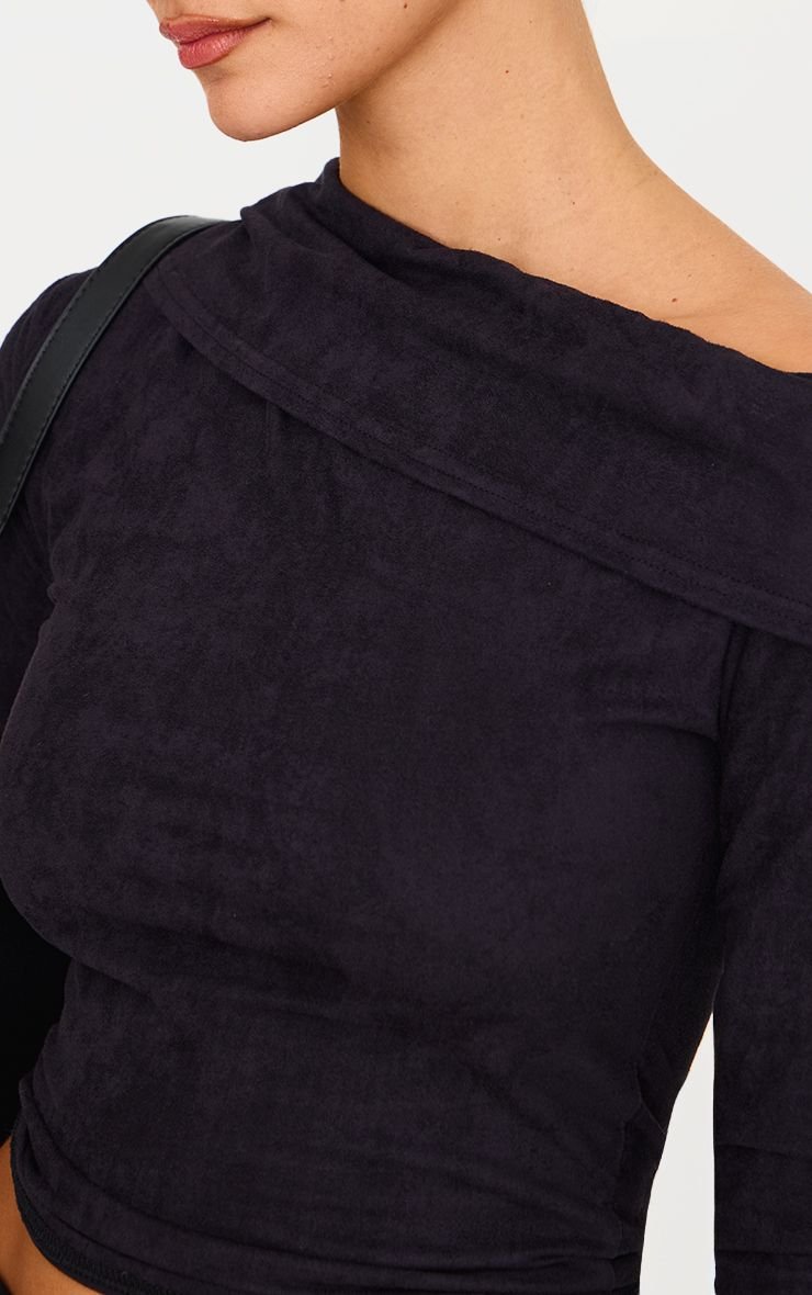 Haut f PU asymétrique b ktef 3eryan