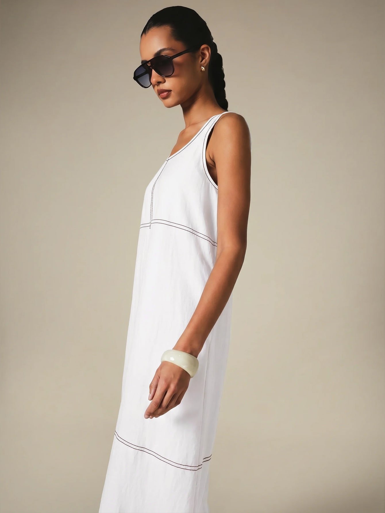 Sleeveless contrast-stitch midi dress with pockets