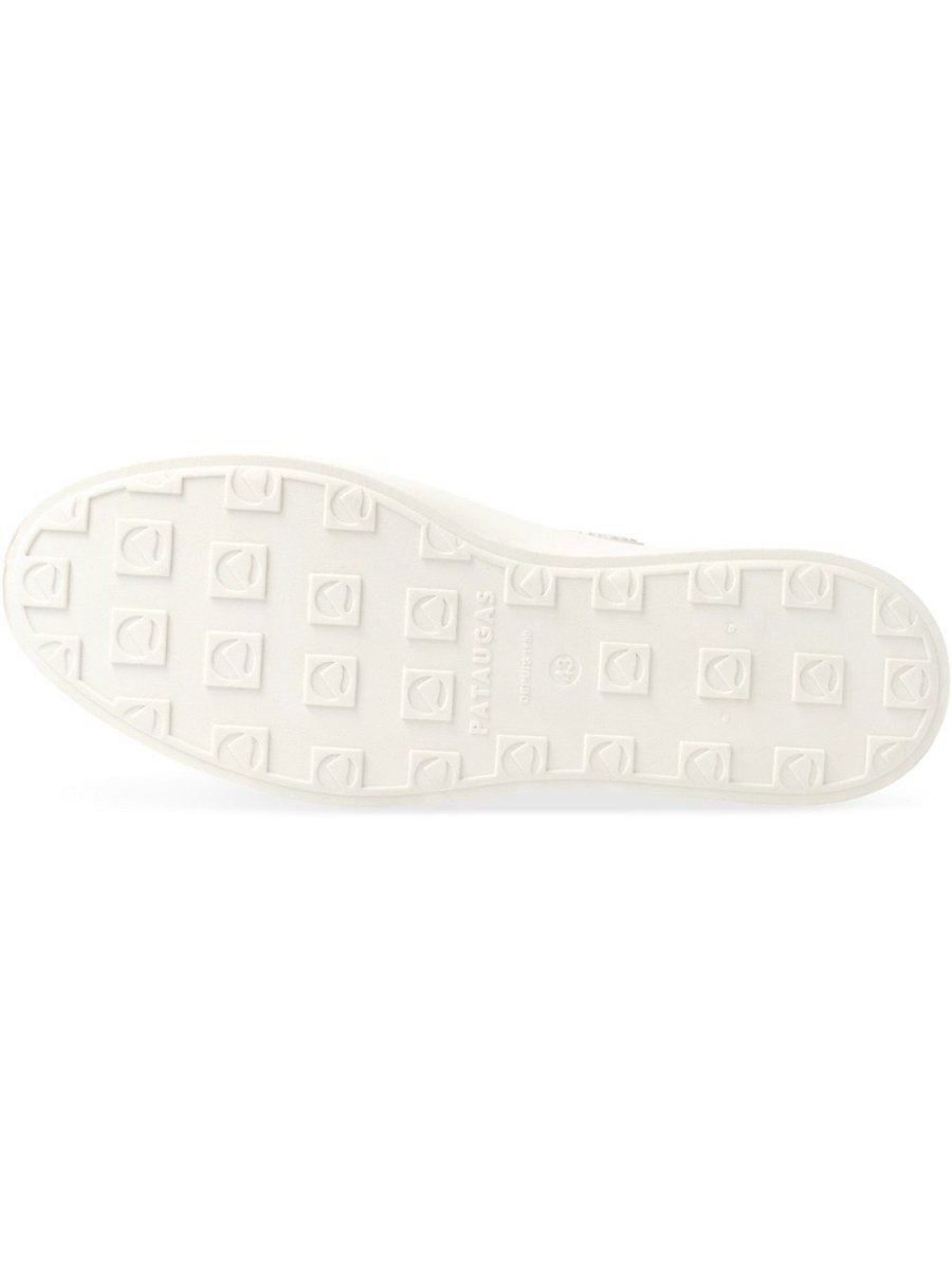 Beige canvas sneakers with rubber toe