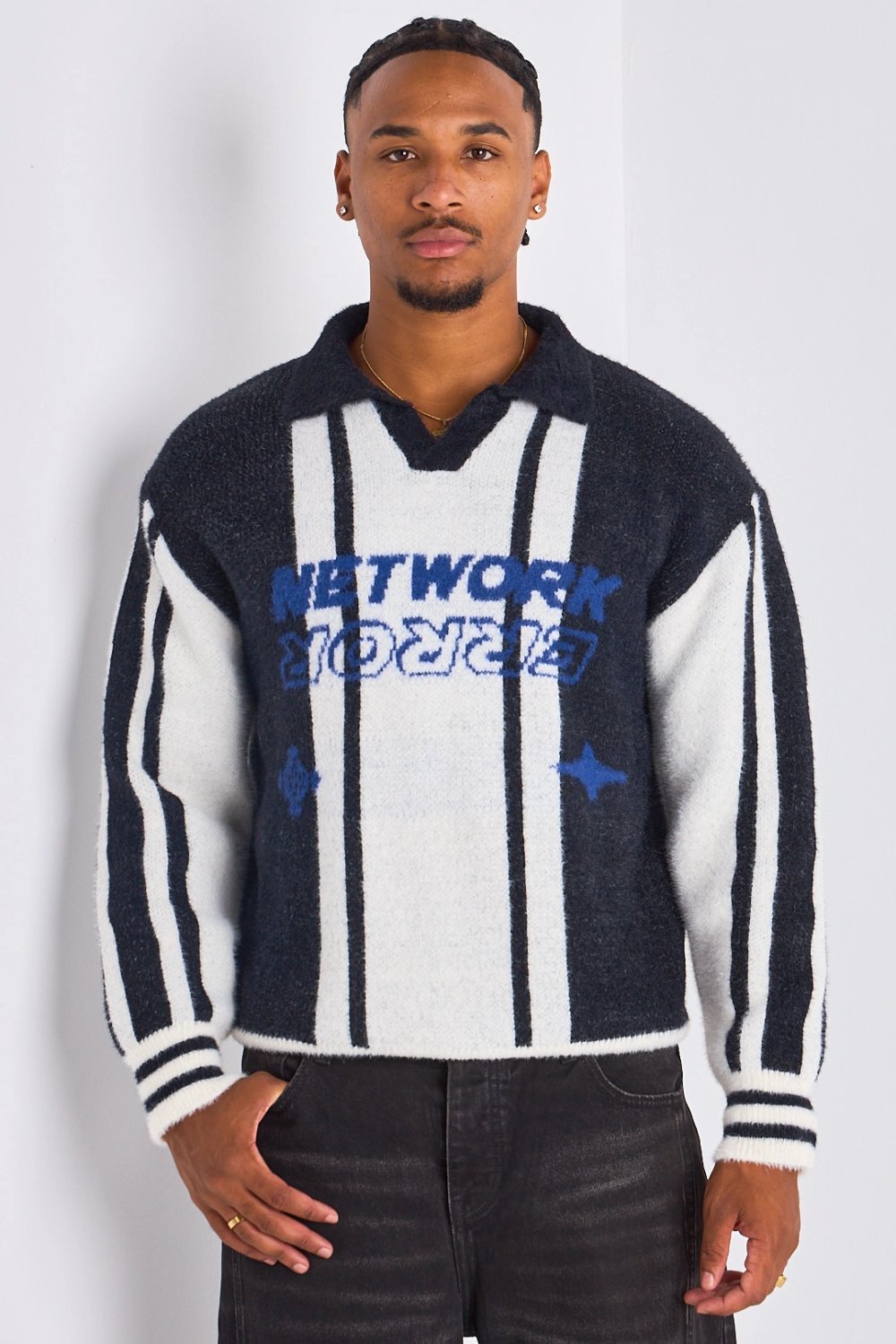 Black jumper with black collar and slogans