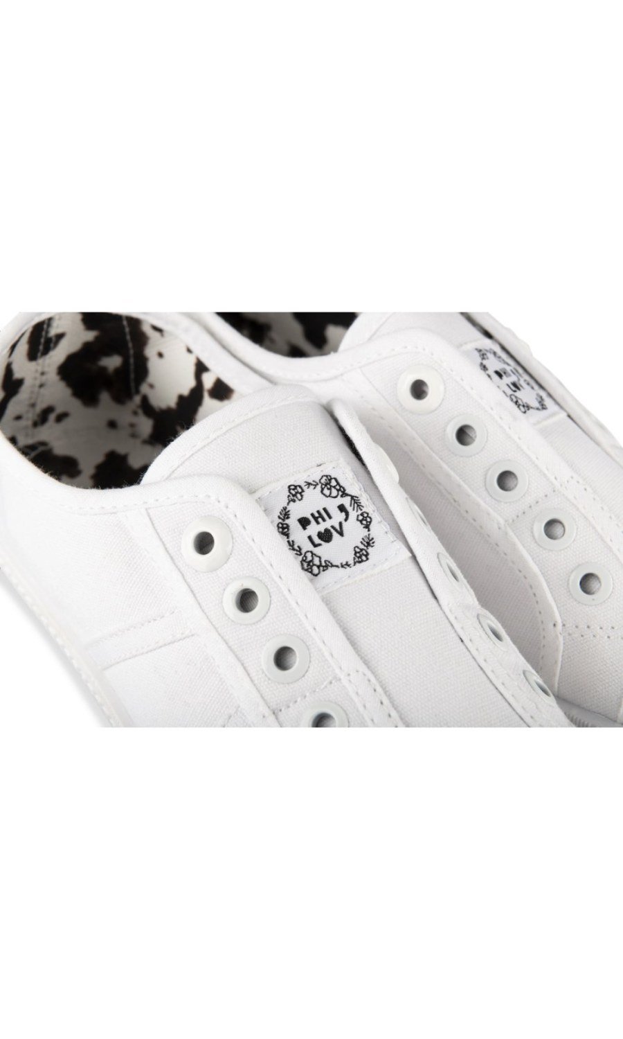 White canvas plimsolls with toe cap