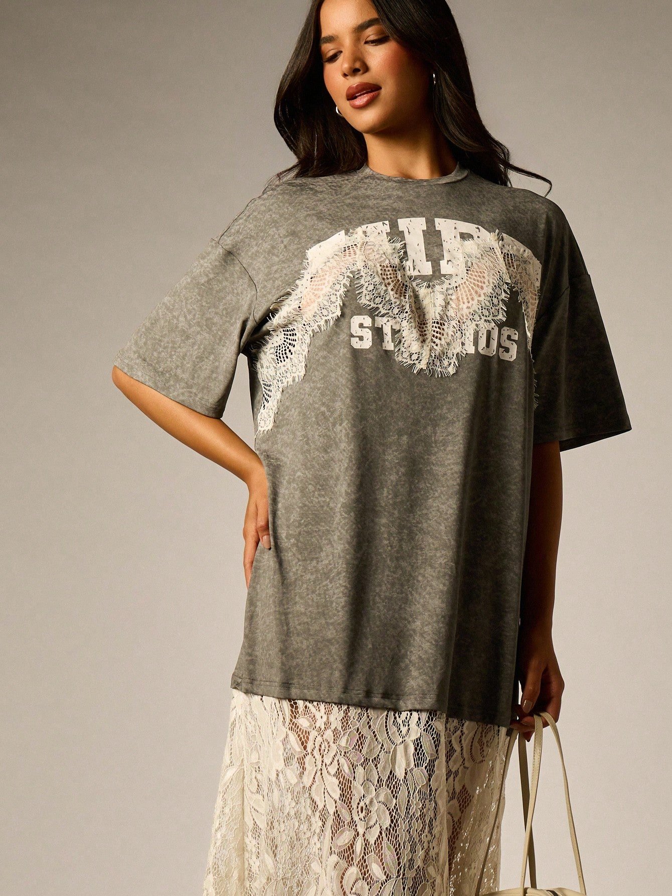 Oversized acid wash tee with lace angel wings