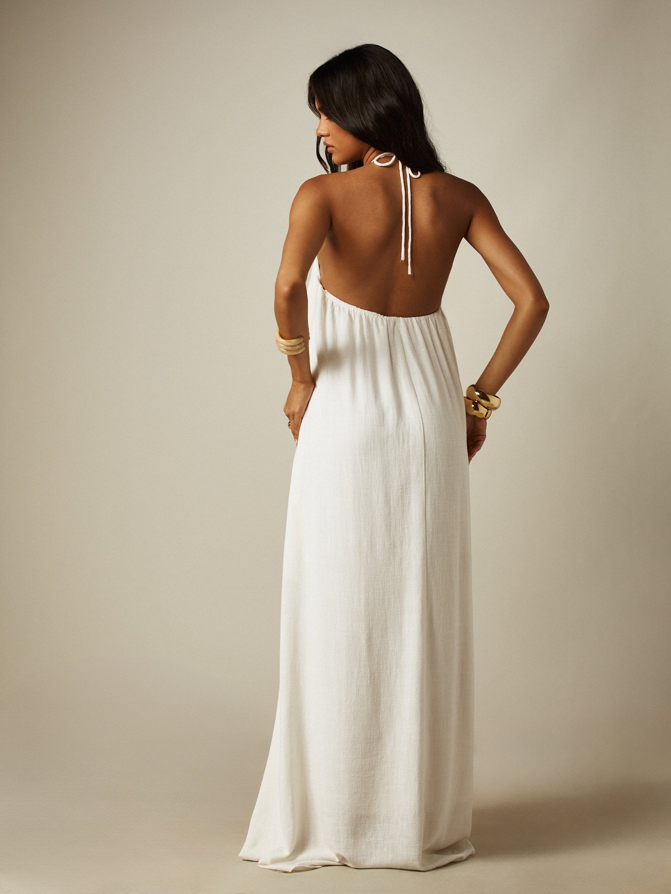 Flowing backless halter neck maxi dress
