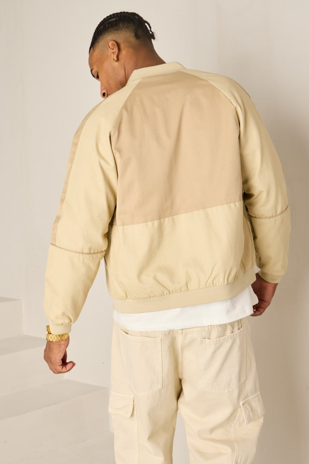 Beige mixed-fabric bomber jacket