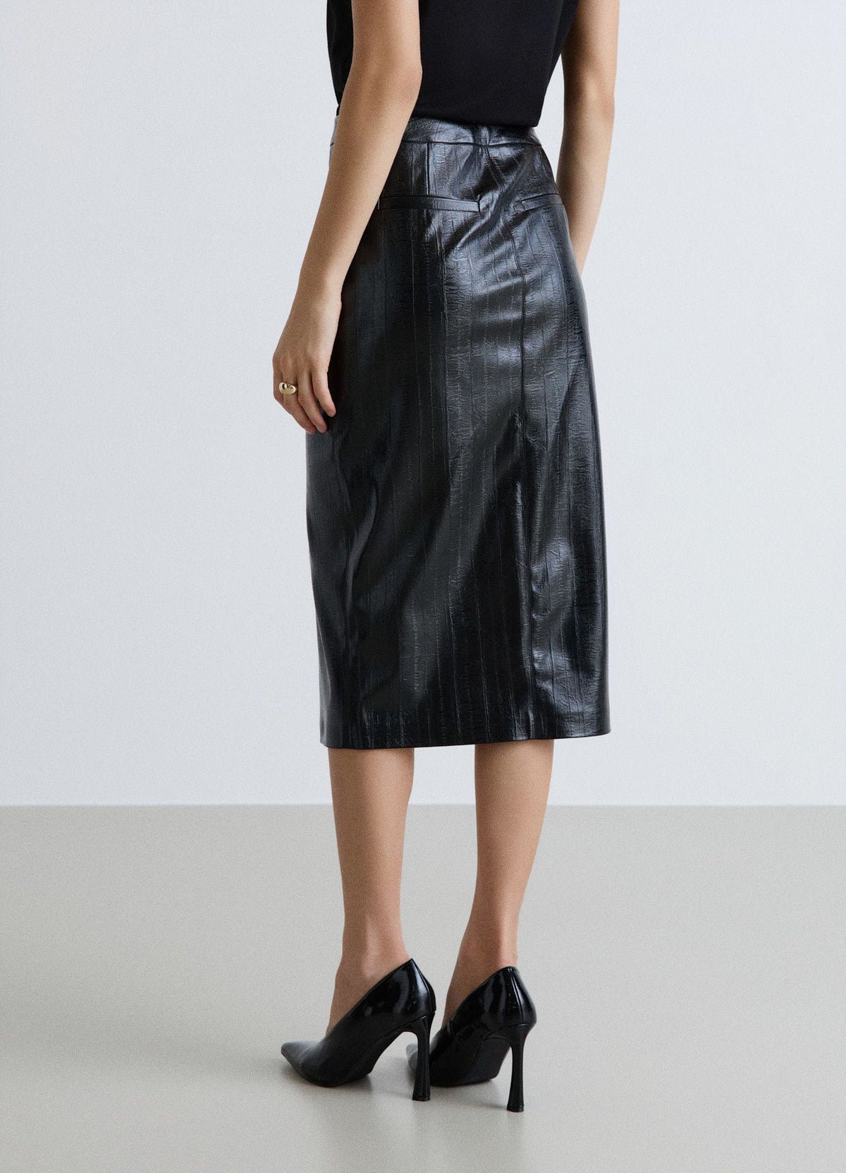 Jupe crayon midi effet cuir fendue