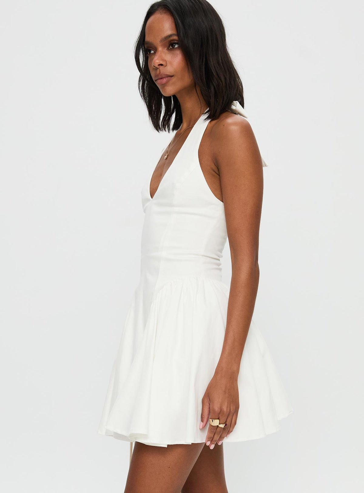 Halter mini dress with side pleats