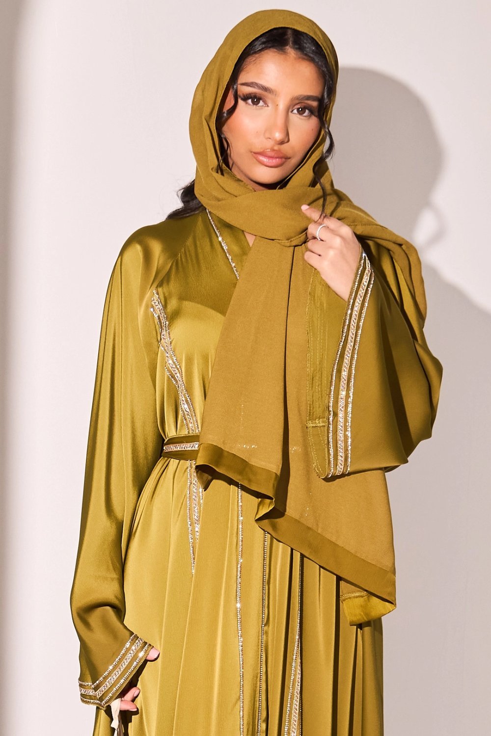 Olive green abaya with two-tone rhinestone stripes