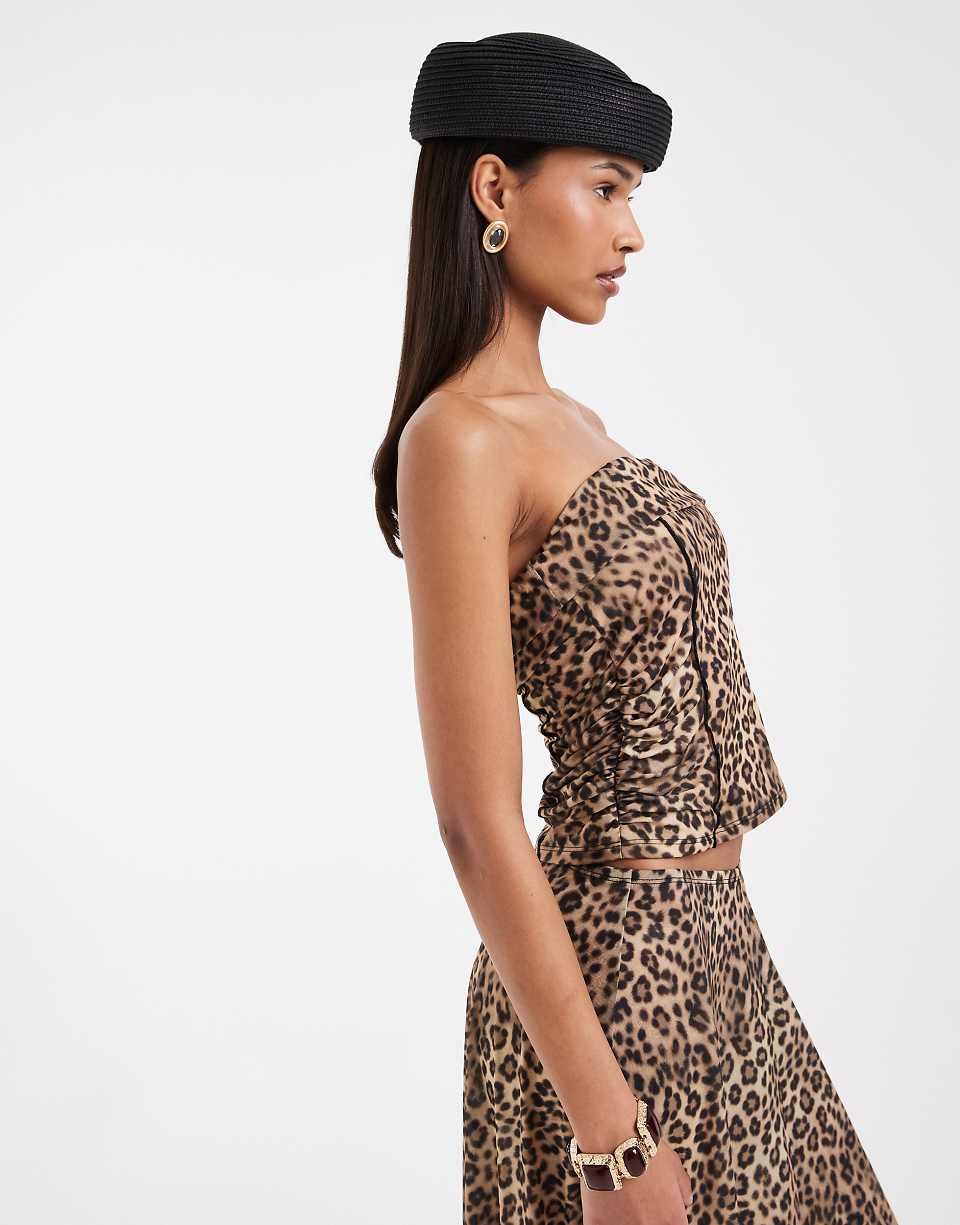 Stretch chiffon bandeau top with exposed seams and leopard print
