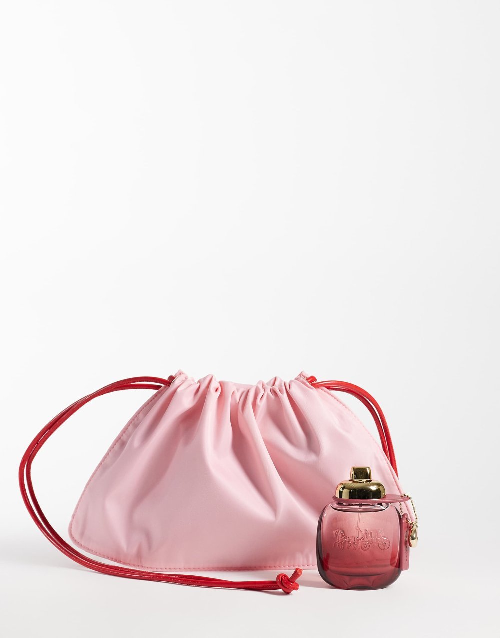 Pink drawstring clutch bag