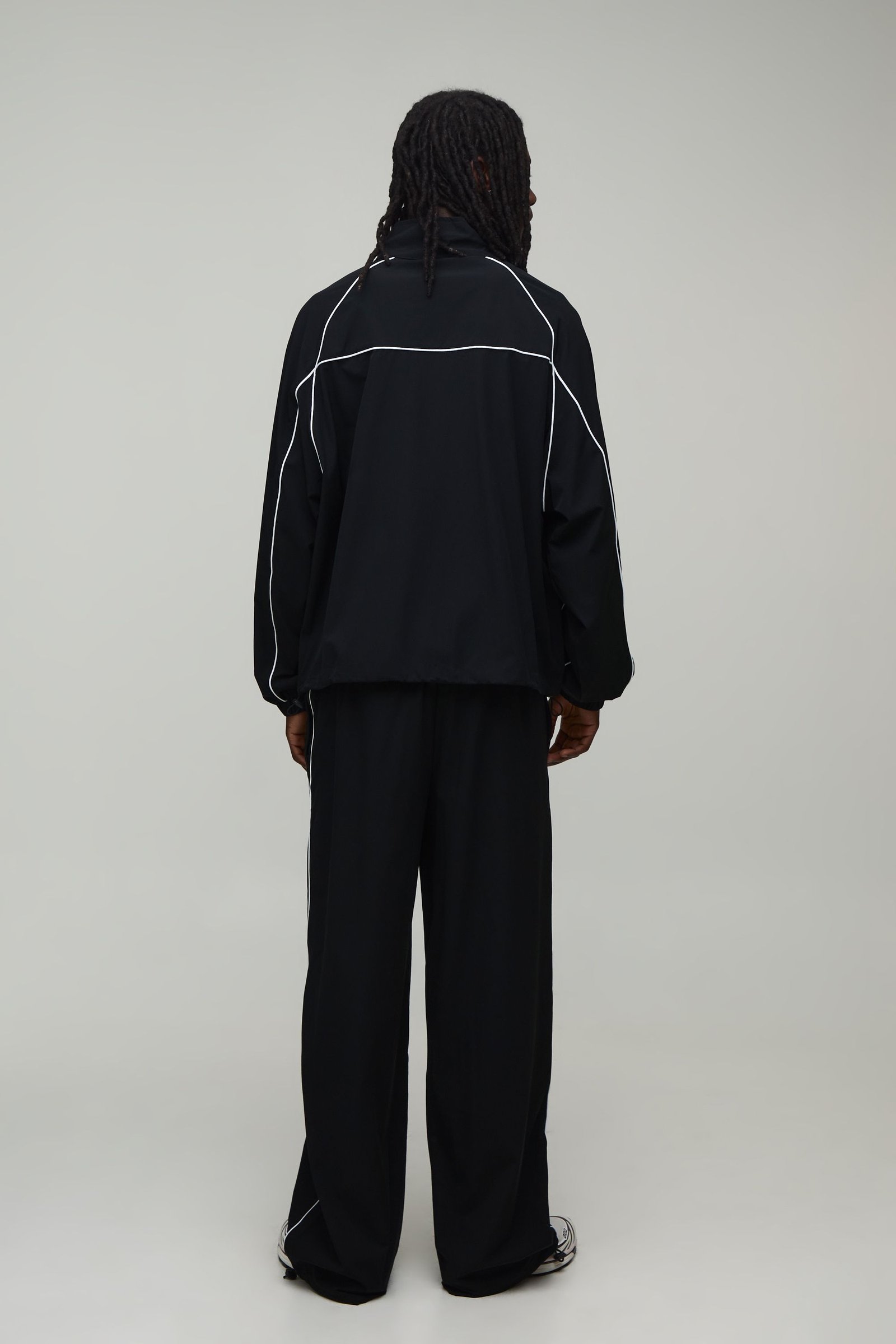 Survêtement en nylon zippé à col montant
